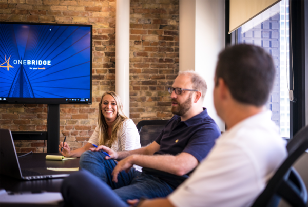 The OneBridge team brainstorming